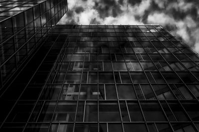 Low angle view of office building against sky