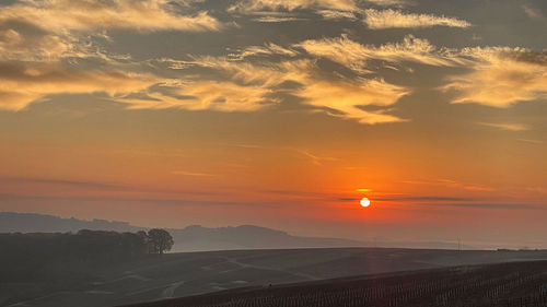 Scenic view of sunset over land, champagne region, wine,turism.