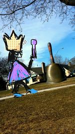 View of trees against blue sky