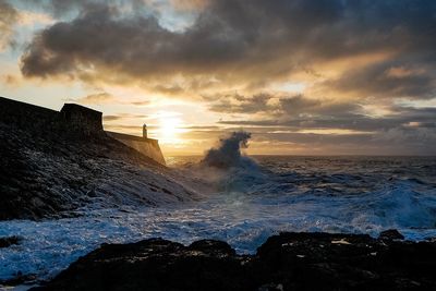 Scenic view of sea against sky during sunset