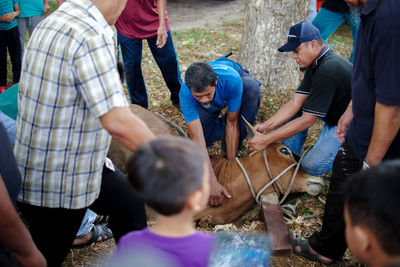 High angle view of people standing on land