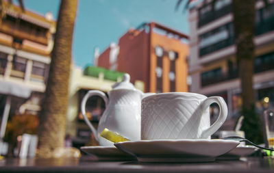 Close-up of coffee cup on table