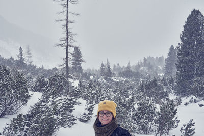 Portrait of woman in snow