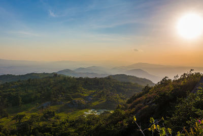 Scenic view of mountains against sky during sunset