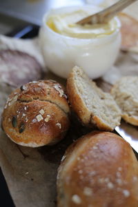 Close-up of bread and butter on a baking tray on table
