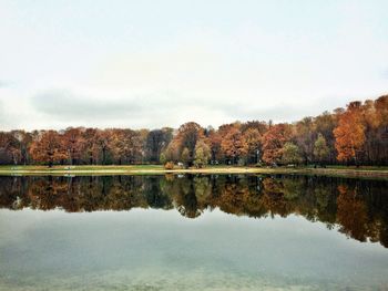 Scenic view of lake against sky during autumn