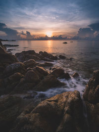 Scenic view of sea against sky during sunset