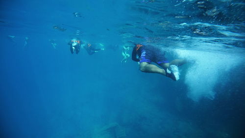 Woman swimming in sea