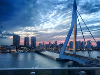 Cityscape against cloudy sky