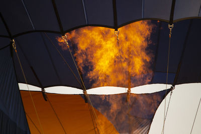 Low angle view of fire against sky