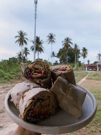 Close-up of food on table against sky