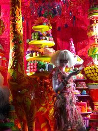 Woman standing in front of a store