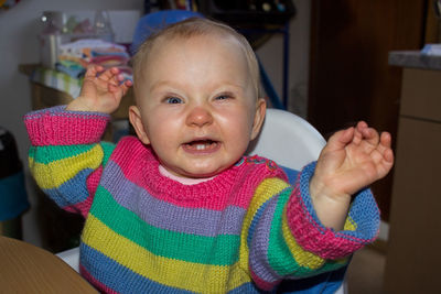 Portrait of cute baby boy at home