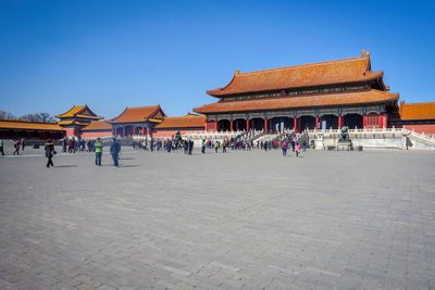 Group of people in front of building