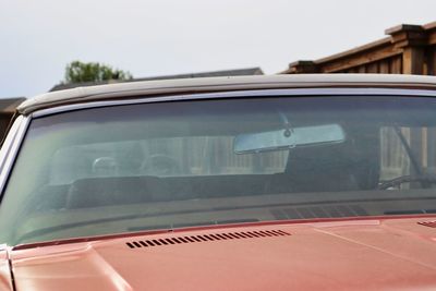 Reflection of sky on car window