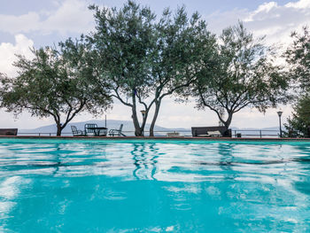 View of swimming pool against blue sky