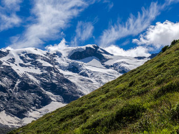 Scenic view of mountains against sky during winter