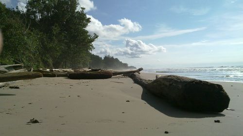 View of calm beach against the sky