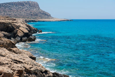 Scenic view of sea against clear sky