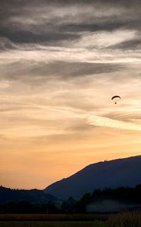 Scenic view of silhouette landscape against sky during sunset