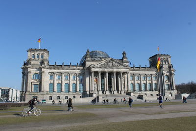 Group of people in front of building