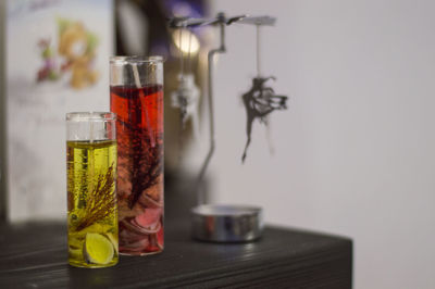 Close-up of glasses on table