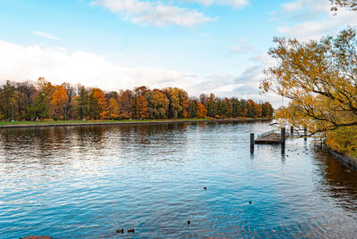 Scenic view of lake against sky during autumn