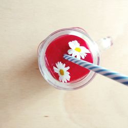 High angle view of flowers in jar on table