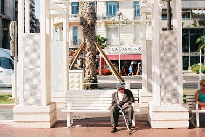 Full length of man on building in city