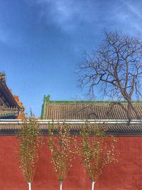 Low angle view of building against blue sky