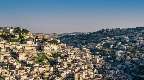 High angle shot of townscape against clear sky