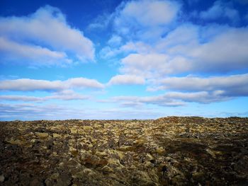 Scenic view of land against sky