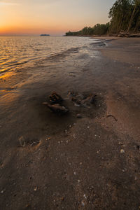Scenic view of sea against sky during sunset