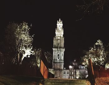 Illuminated church tower at night