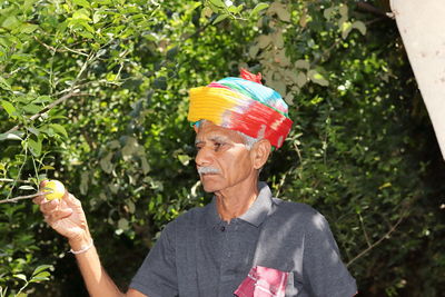 Close-up portrait of an indian senior farmer dressed according to rajasthani culture and tradition 