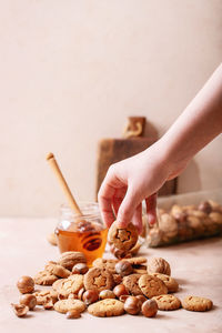 Midsection of woman preparing food on table