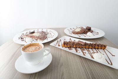 Close-up of coffee served on table