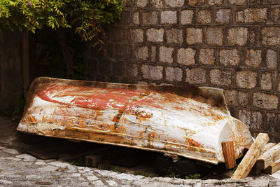 Old rusty metal against wall