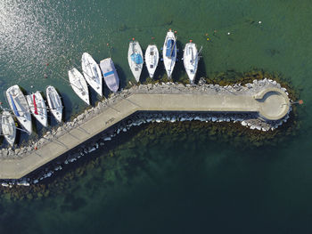 Aerial view of a dock with moored boats