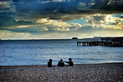 Scenic view of sea against cloudy sky