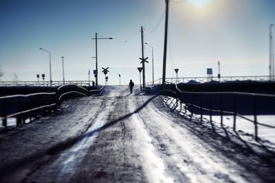Surface level of street against clear sky