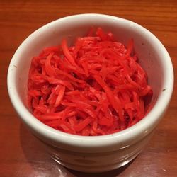 High angle view of red salad in bowl on table