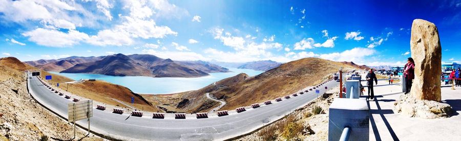 Panoramic view of snowcapped mountains against sky