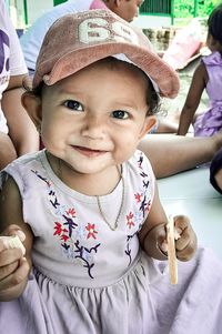 Portrait of cute baby in hat