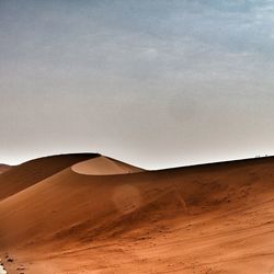 Scenic view of desert against sky