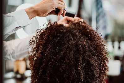 Close-up portrait of woman holding ice cream
