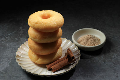 Homemade fresh fried donuts frosted with cinnamon and sugar