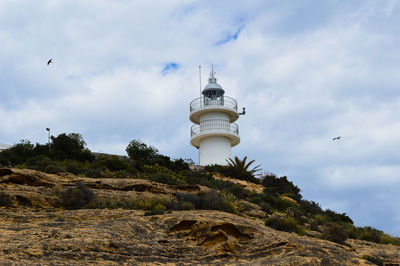 Low angle view of lighthouse against sky