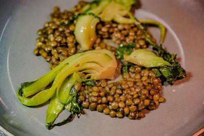 High angle view of vegetables in plate on table