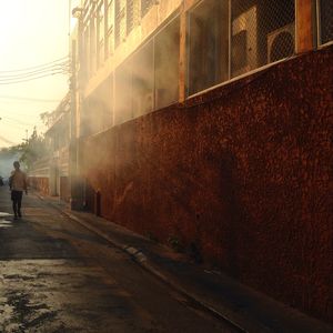 People walking on road in city